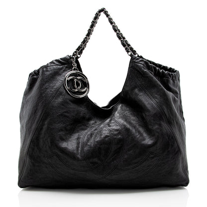 Chanel Quilted Leather CC Charm Hobo - image 1