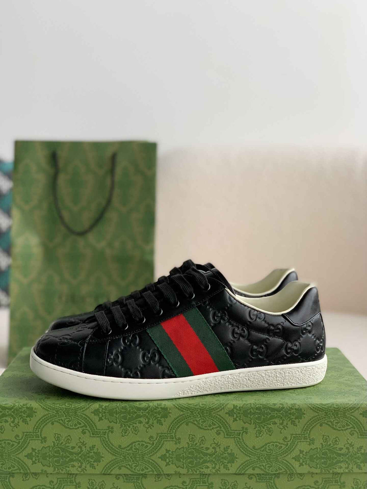 Gucci Ace Sneaker – Black GG Embossed Leather with Green & Red Web - image 1