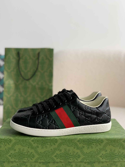 Gucci Ace Sneaker – Black GG Embossed Leather with Green & Red Web - image 1