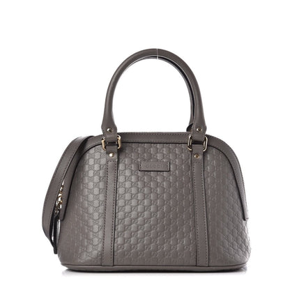 Gg Debossed Handbag In Grey - image 1