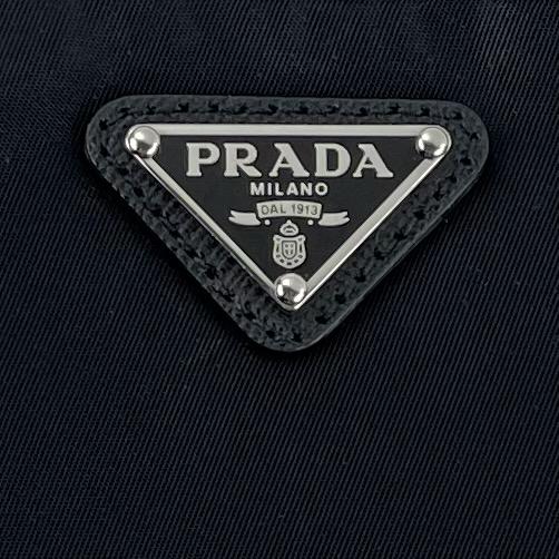 Prada Saffiano-Trimmed Tessuto Wristlet - photo 3
