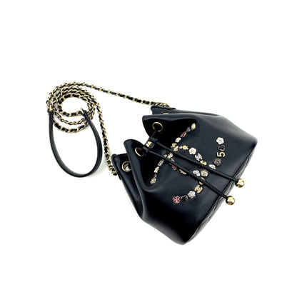 CHANEL Logo Charm CC Lambskin Drawstring Bucket Bag - image 5