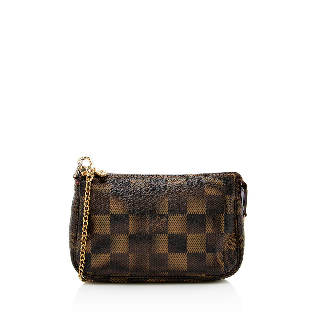 Louis Vuitton Damier Ebene Mini Pochette Accessoires - photo 1