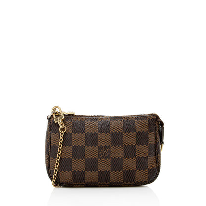 Louis Vuitton Damier Ebene Mini Pochette Accessoires - photo 1