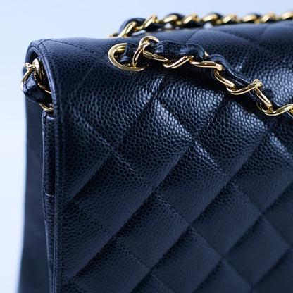 Chanel Maxi Classic Double Flap Black Caviar 2022 - photo 6
