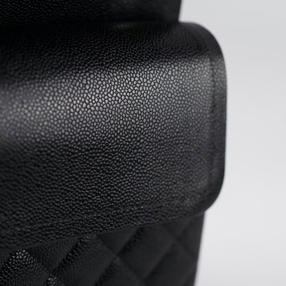 Chanel Maxi Classic Double Flap Black Caviar 2022 - photo 10