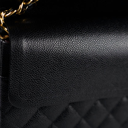 Chanel Maxi Classic Double Flap Black Caviar 2022 - photo 11