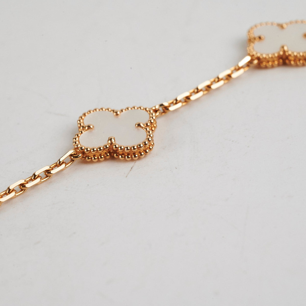 ITEM 22 - Van Cleef & Arpels Vintage Alhambra 5-Motif Yellow Gold, White Mother of Pearl Bracelet - photo 4