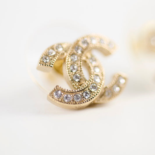 Chanel logo earrings gold tone - photo 2