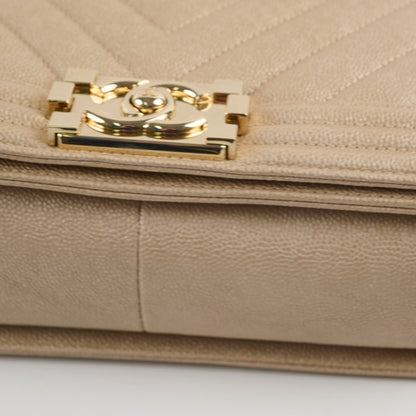 Chanel Medium Boy Caviar Champagne Gold - photo 11
