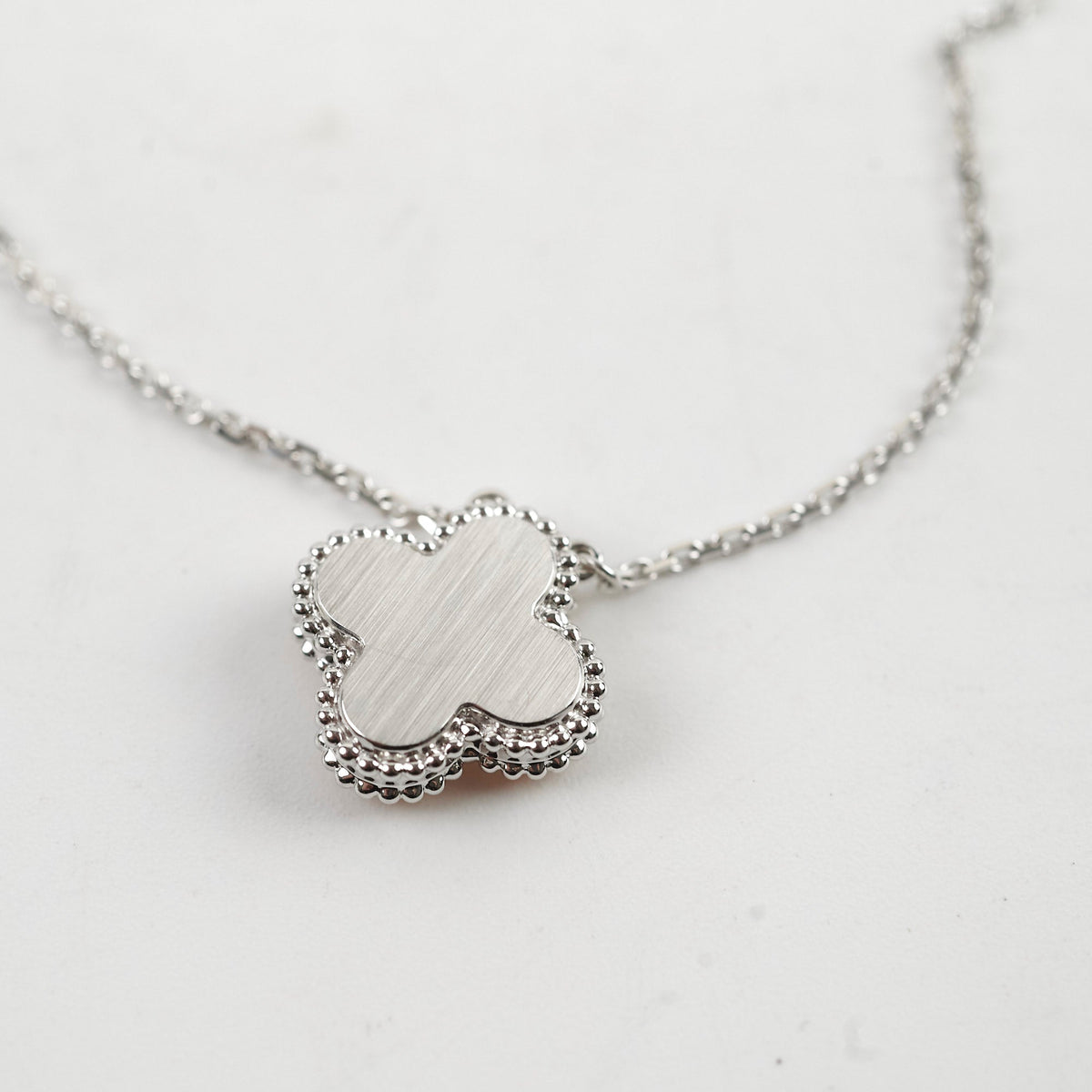 Van Cleef & Arpels Vintage Alhambra Pendant Necklace White Gold Guilloche Rose Gold Diamond 2024 - photo 5