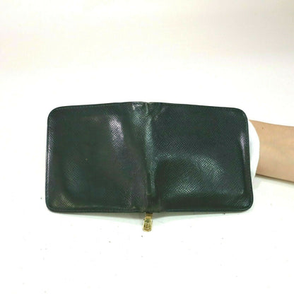 Louis Vuitton Taiga Bifold Zip - photo 12