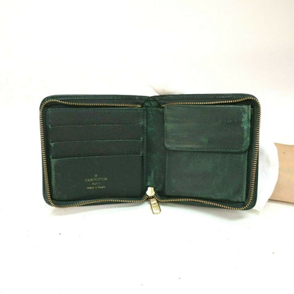 Louis Vuitton Taiga Bifold Zip - photo 5