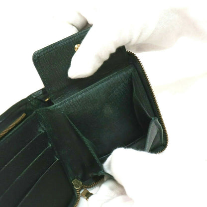 Louis Vuitton Taiga Bifold Zip - photo 8