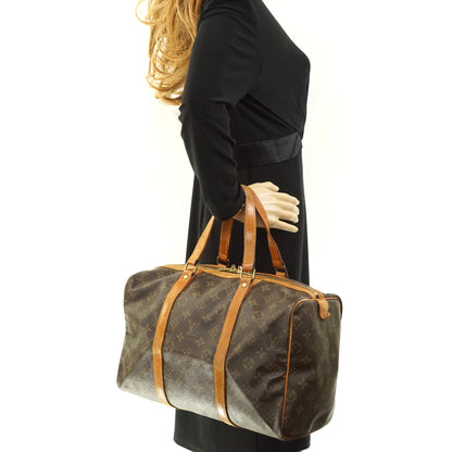 Louis Vuitton Sac Souple 35 Hand - photo 2